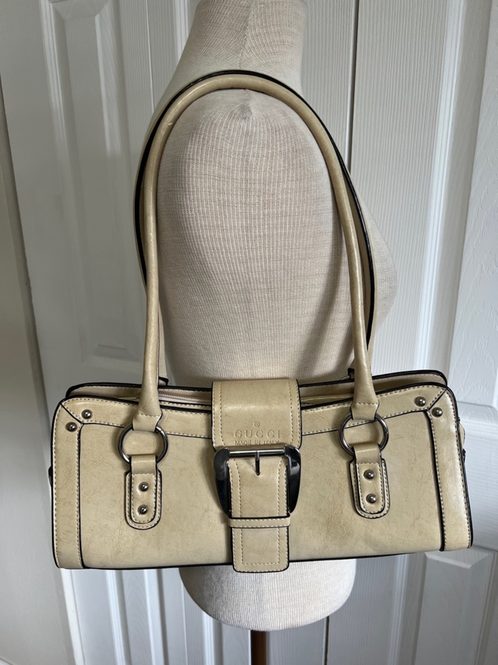 Vintage Gucci Cream Colored Leather Shoulder Bag Featuring a large Silver Buckle